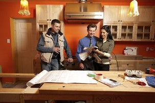 People looking at Blue Prints, Site Inspections in Glasgow, Lanarkshire